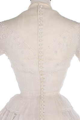 Lot 142 - A Carven couture embroidered and beaded white...