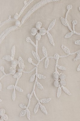 Lot 142 - A Carven couture embroidered and beaded white...