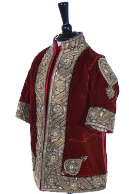 Lot 274 - A boy's embroidered scarlet velvet court coat, Indian, late 19th century