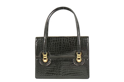 Lot 2 - A Gucci black crocodile handbag, 1960s