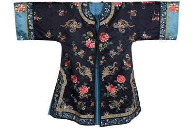 Lot 306 - An embroidered dark blue satin informal robe, chang-fu, Chinese, circa 1920