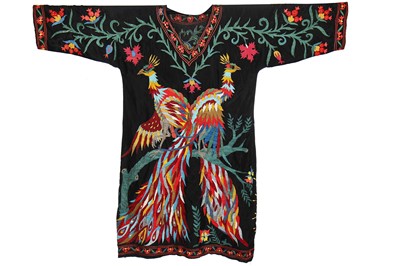 Lot 291 - A robe embroidered with large-scale peacocks, Central Asian, 20th century