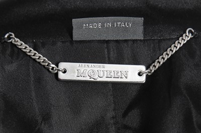 Lot 49 - An Alexander McQueen black silk patchwork jacket, circa 2003