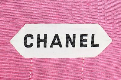 Lot 8 - A Chanel couture shocking-pink tweed suit, Spring-Summer 1966