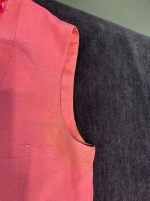 Lot 8 - A Chanel couture shocking-pink tweed suit, Spring-Summer 1966