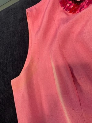 Lot 8 - A Chanel couture shocking-pink tweed suit, Spring-Summer 1966
