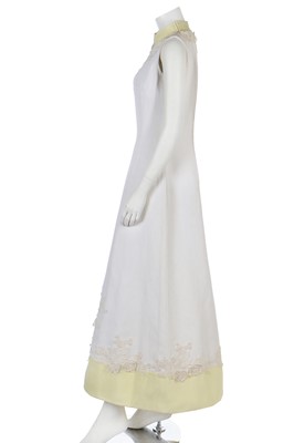 Lot 180 - A Balmain evening gown of white woven cotton by Staron, model 'Narcissus', late 1960s