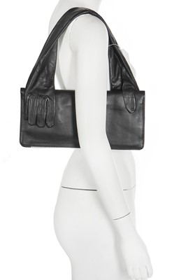 Lot 58 - A group of Maison Margiela for H&M accessories, 2012