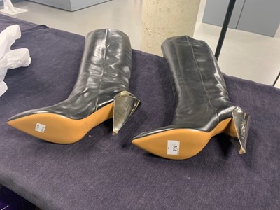 Lot 239 - A pair of Martin Margiela black leather boots with chrome metal heels, 2000s