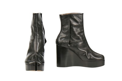 Lot 239 - A pair of Martin Margiela black leather boots with chrome metal heels, 2000s