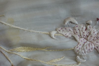 Lot 237 - A burgundy velvet robe appliquéd with large gilt-thread embroidered cranes amongst lily pads, Japanese, probably 1910s
