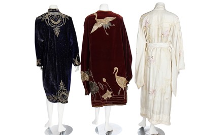 Lot 237 - A burgundy velvet robe appliquéd with large gilt-thread embroidered cranes amongst lily pads, Japanese, probably 1910s