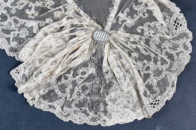Lot 258 - A length of handmade blond Chantilly lace, 19th century