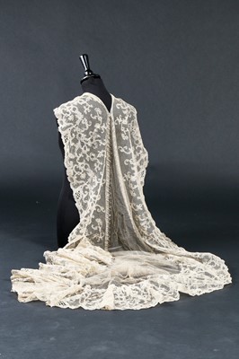 Lot 258 - A length of handmade blond Chantilly lace, 19th century