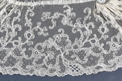 Lot 258 - A length of handmade blond Chantilly lace, 19th century