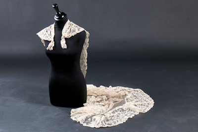 Lot 258 - A length of handmade blond Chantilly lace, 19th century