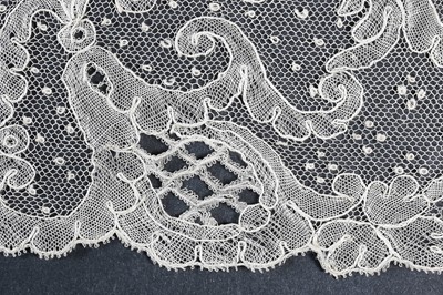 Lot 258 - A length of handmade blond Chantilly lace, 19th century