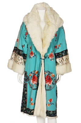 Lot 230 - An embroidered turquoise silk coat formed from an informal robe, Chinese for the European market, late 1920s