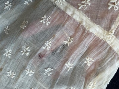 Lot 43 - An embroidered muslin gown, English, circa 1805