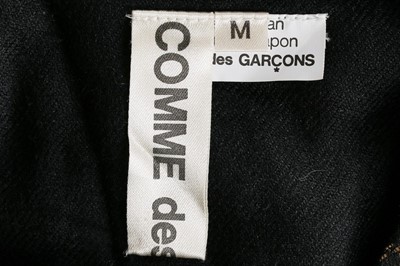 Lot 119 - A Comme des Garçons black wool dress,...
