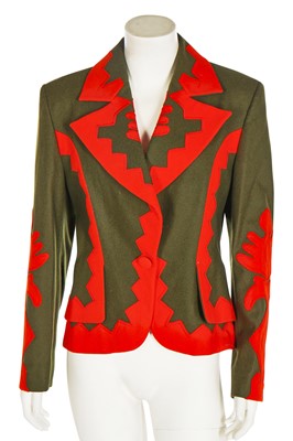 Lot 114 - A Christian Lacroix green wool jacket with orange appliquéd cut-outs, 1990s-early 2000s