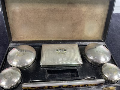 Lot 31 - A Cartier dressing case, the silver fittings 1912