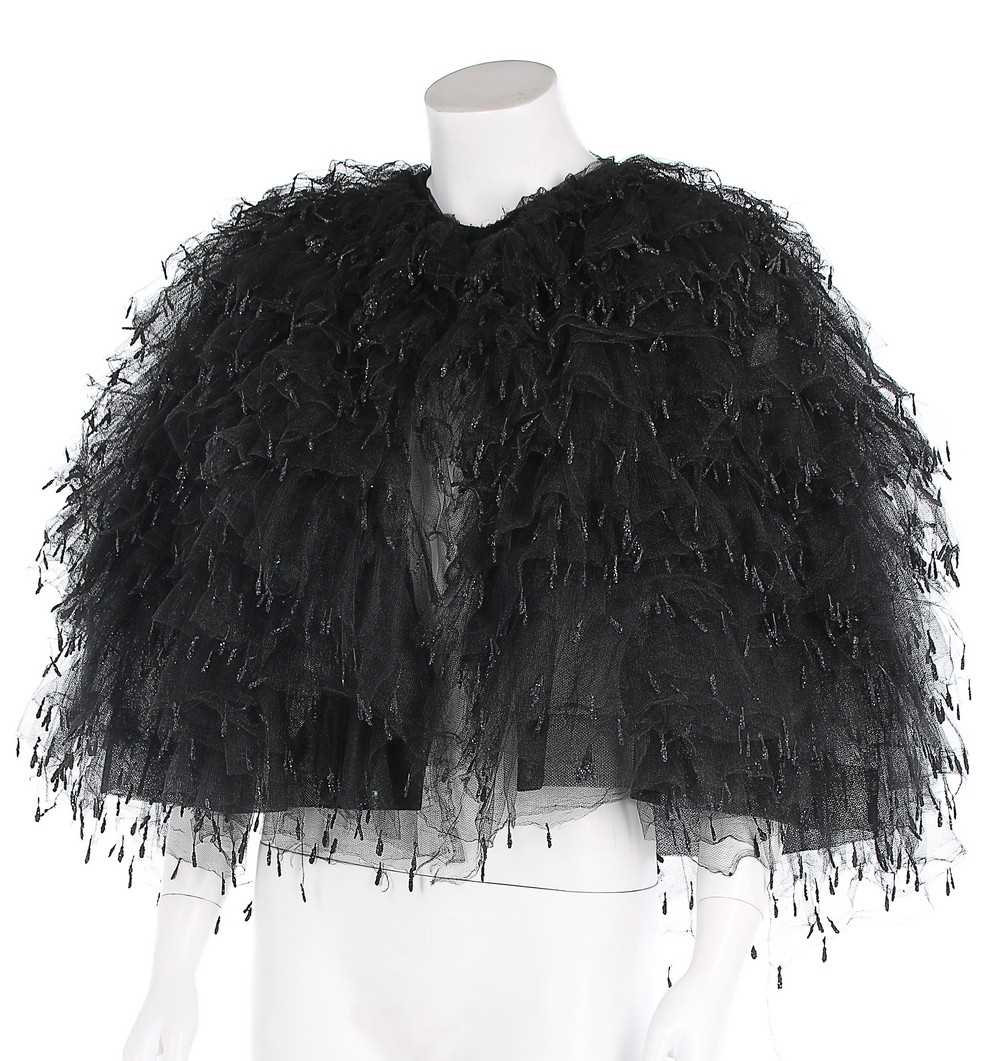 Lot 154 - A rare Balenciaga tiered black tulle evening...