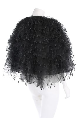 Lot 154 - A rare Balenciaga tiered black tulle evening...