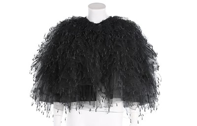 Lot 154 - A rare Balenciaga tiered black tulle evening...