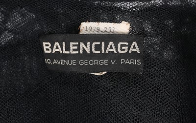 Lot 154 - A rare Balenciaga tiered black tulle evening...