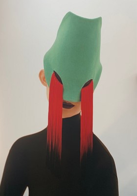 Lot 140 - A Stephen Jones for Jean Paul Gaultier black felt masked-hat, Spring-Summer 1984 collections