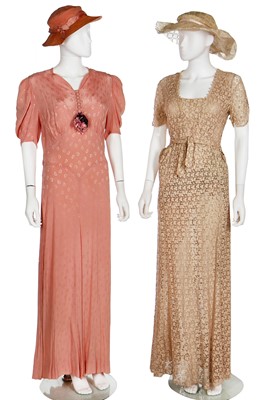 Lot 207 - Ten evening or garden party gowns in mainly pastel shades, 1930s-early 1950s