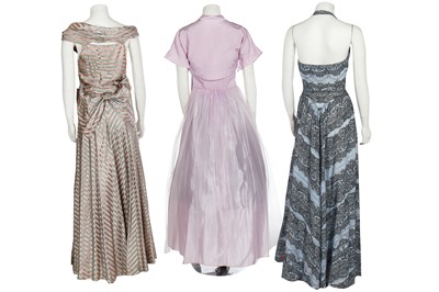 Lot 207 - Ten evening or garden party gowns in mainly pastel shades, 1930s-early 1950s