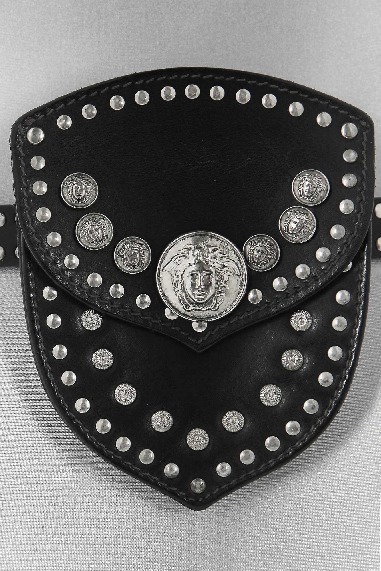 Lot 40 - A Gianni Versace studded leather belt-bag,