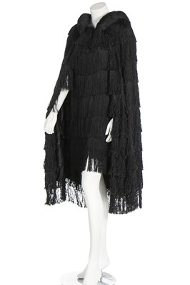 Lot 208 - An evening cape of black silk fringing, circa 1930