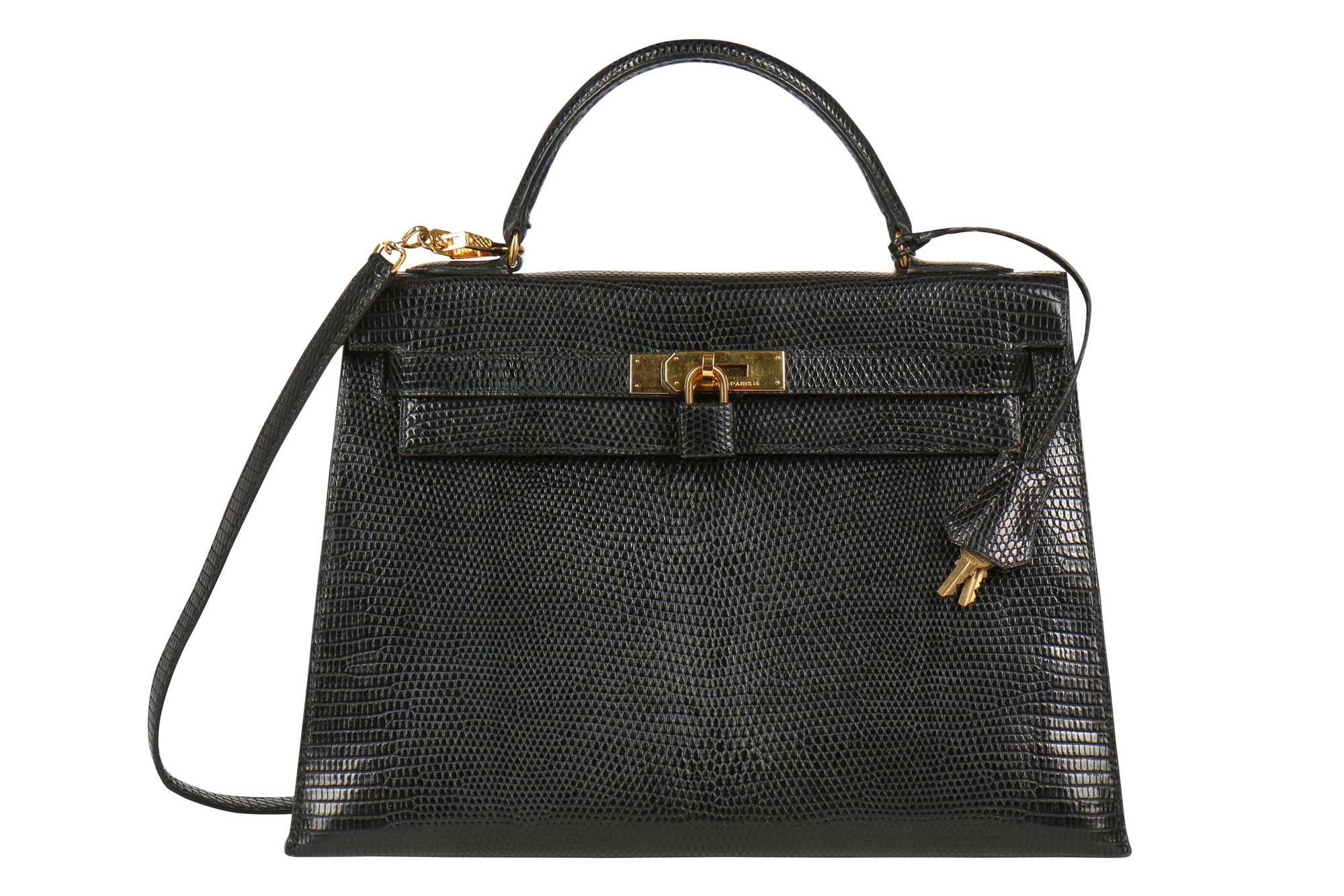Click for high resolution Lot 4 - An Hermès black niloticus lizard Kelly 32, 1989