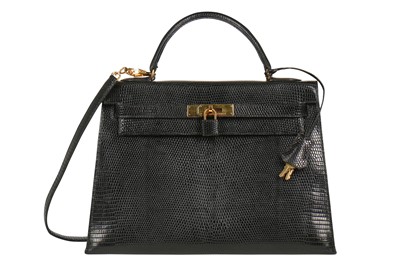 Lot 4 - An Hermès black niloticus lizard Kelly 32, 1989