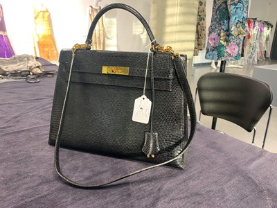 Lot 4 - An Hermès black niloticus lizard Kelly 32, 1989
