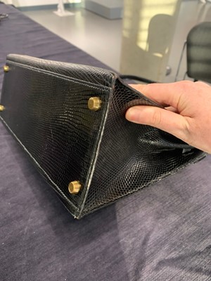 Lot 4 - An Hermès black niloticus lizard Kelly 32, 1989
