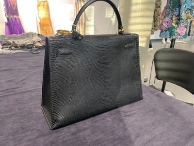 Lot 4 - An Hermès black niloticus lizard Kelly 32, 1989