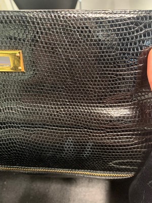 Lot 4 - An Hermès black niloticus lizard Kelly 32, 1989