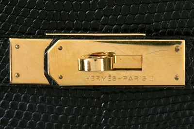 Lot 4 - An Hermès black niloticus lizard Kelly 32, 1989