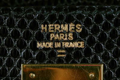 Lot 4 - An Hermès black niloticus lizard Kelly 32, 1989
