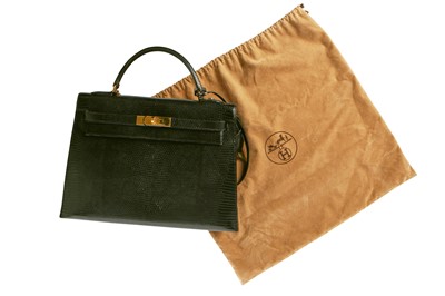 Lot 4 - An Hermès black niloticus lizard Kelly 32, 1989
