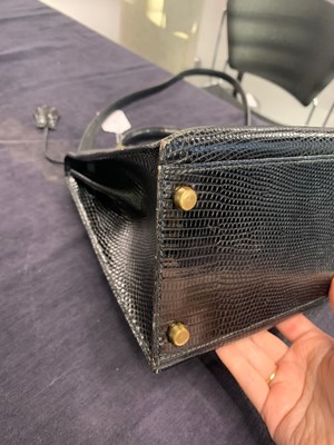 Lot 4 - An Hermès black niloticus lizard Kelly 32, 1989