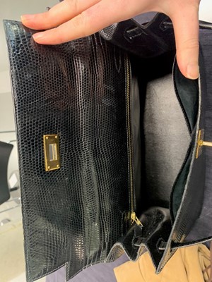 Lot 4 - An Hermès black niloticus lizard Kelly 32, 1989