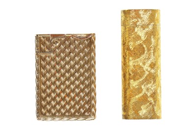Lot 32 - A Cartier brushed-gold plated lighter, 20th century