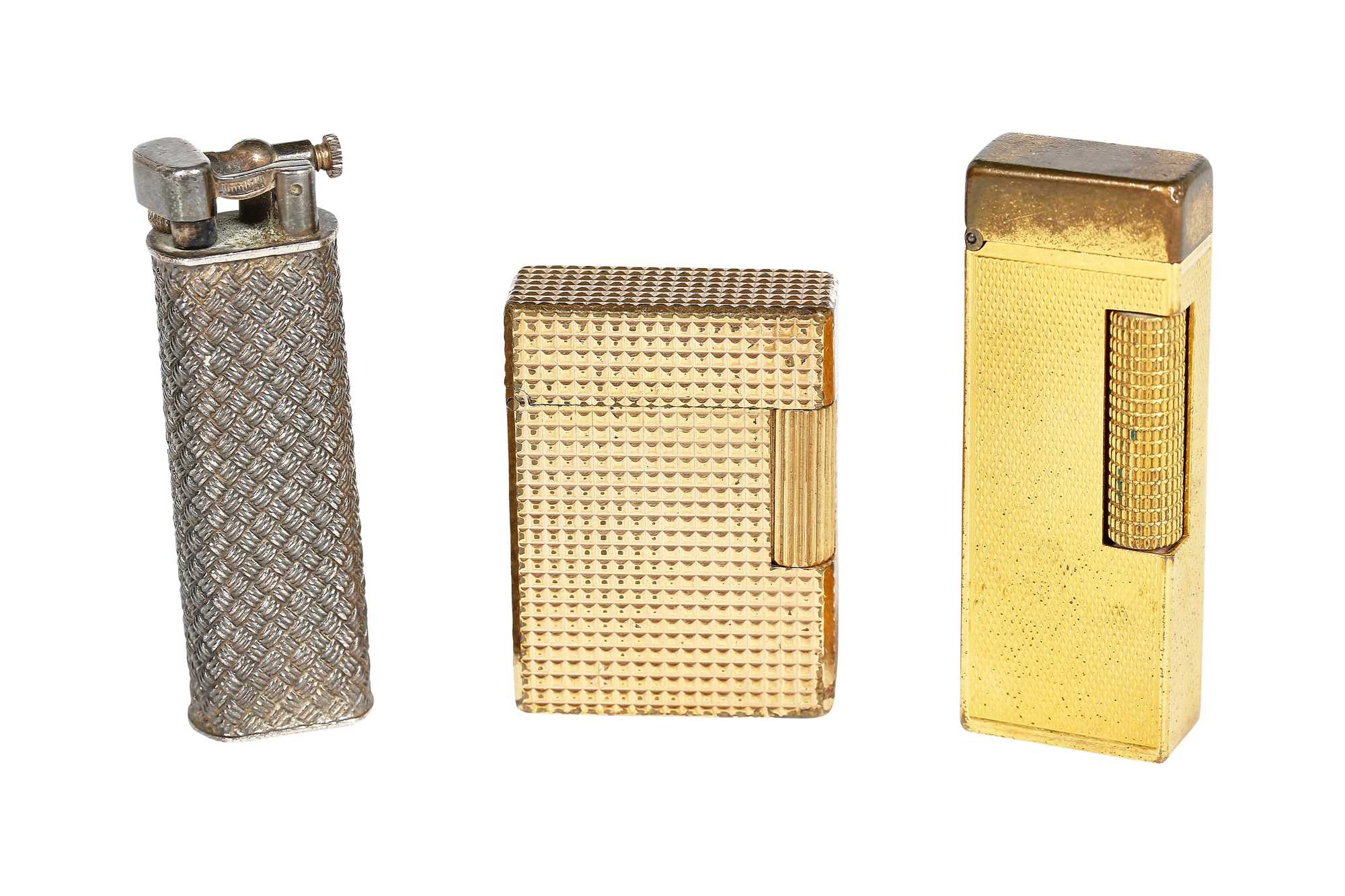 Lot 32 - A Cartier brushed-gold plated lighter, 20th