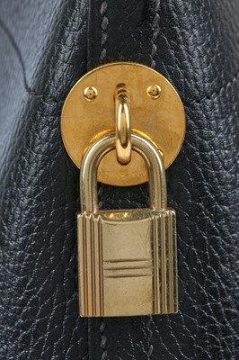 Lot 3 - An Hermès black epsom leather Bolide bag, 1993
