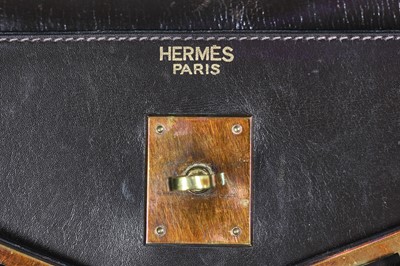 Lot 34 - An Hermès brown box leather Kelly 32, 1970